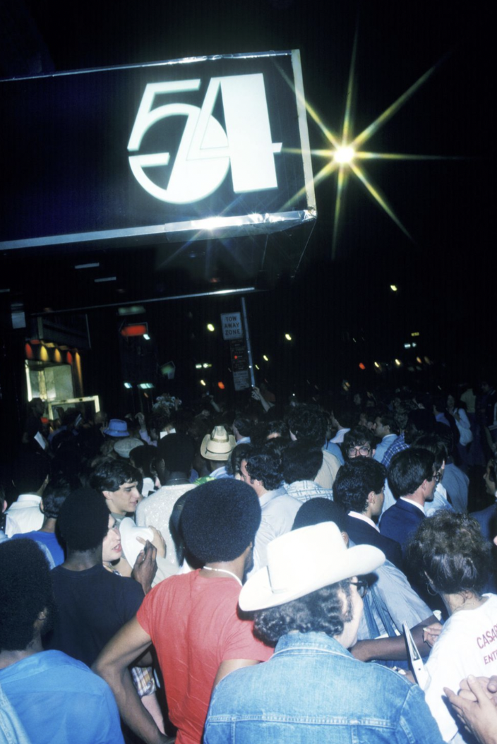 People wait in line outside of Studio 54, Manhattan, NYC, 1978.