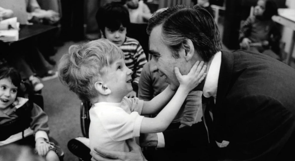 Fred Rogers meeting an unnamed boy in a wheelchair during his visit to The Children's Institute, Pittsburg, 1978. 