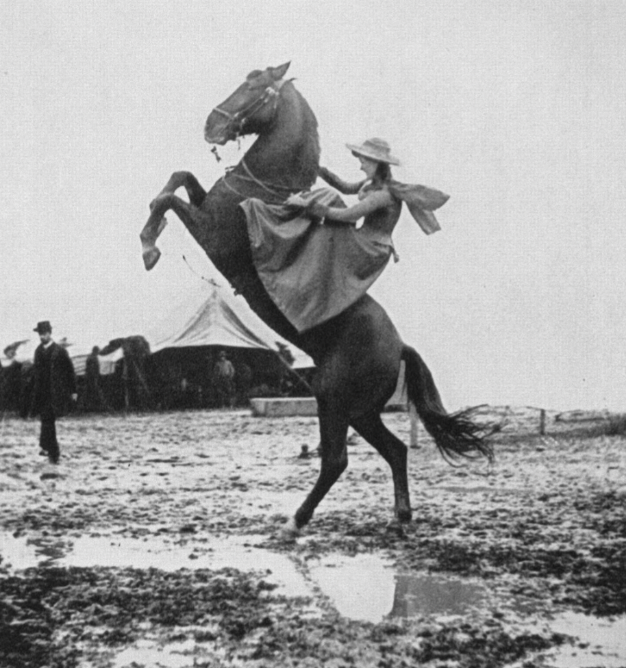 annie oakley riding a horse