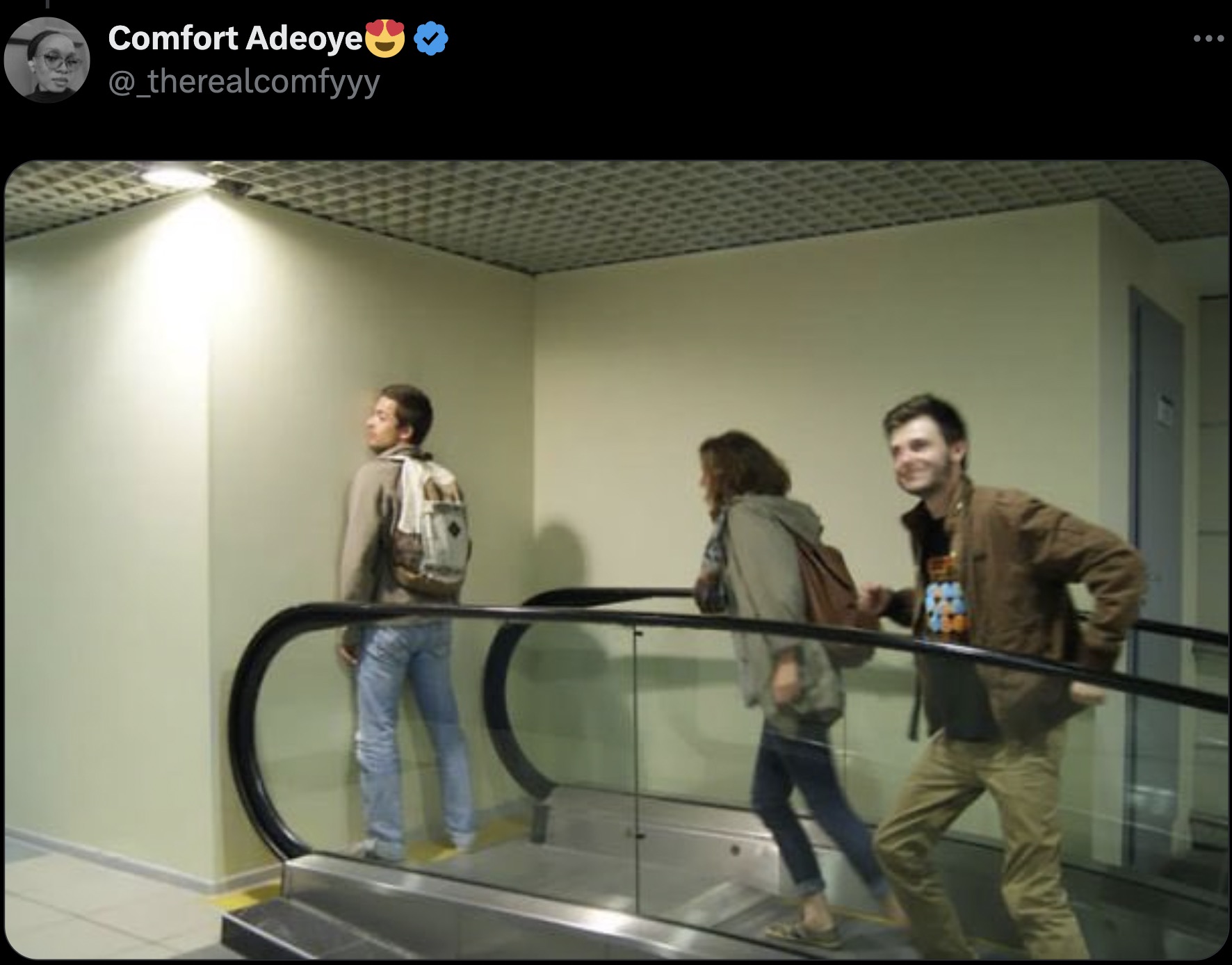 escalator into wall - Comfort Adeoye