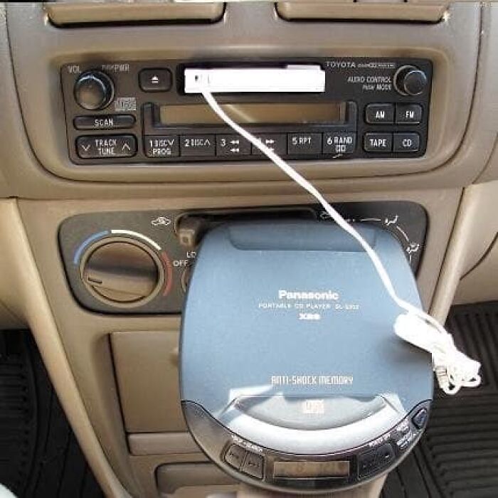 Before CD players and bluetooth / mp3, you had to buy a cassette tape adapter that hooked to a discman and went  inside the radio to play your CD's.