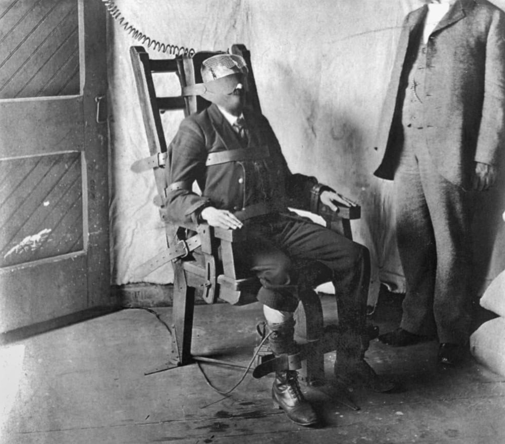 man in electric chair