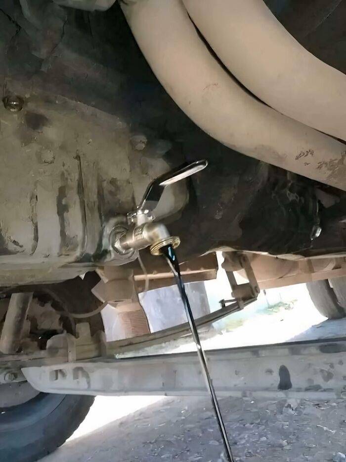 This guy made his own spigot to easily drain out oil during changes, without the mess.