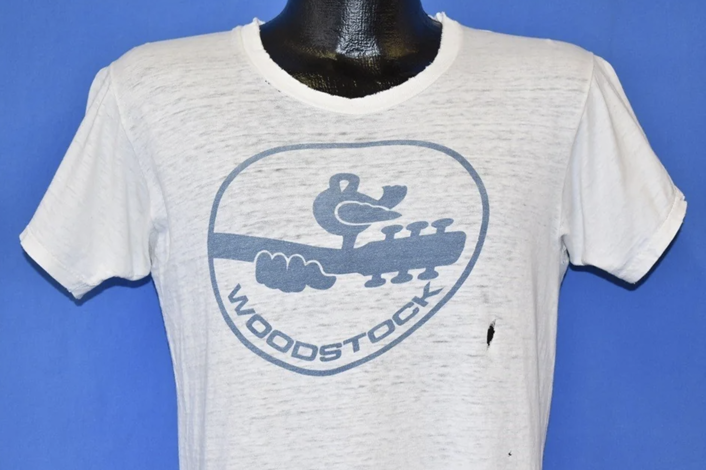 There was no official Woodstock merch in 1969, meaning that any shirts for sale were made by independent creators. Original shirts from the festival have fetched over $1,000 at auctions. 