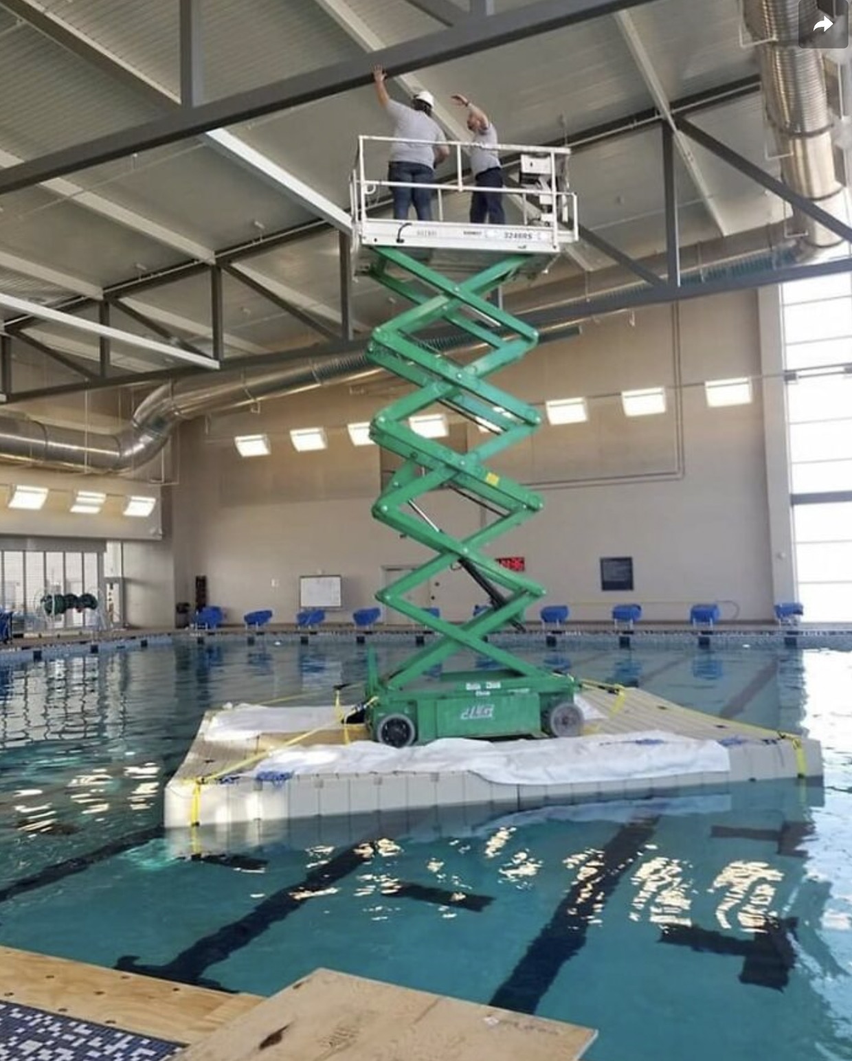 scissor lift in pool - 572