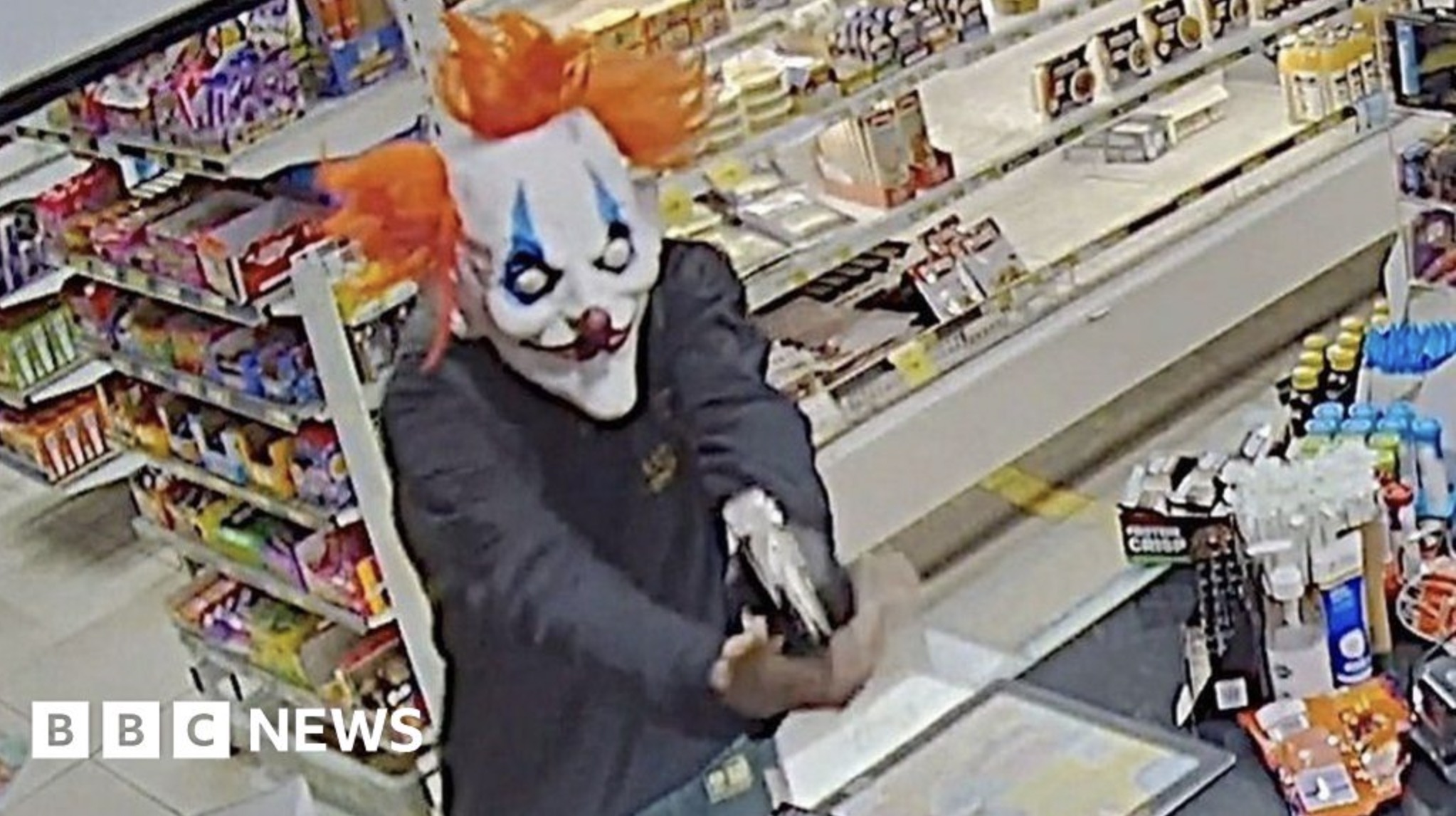 clown mask armed robbery - Bbc News