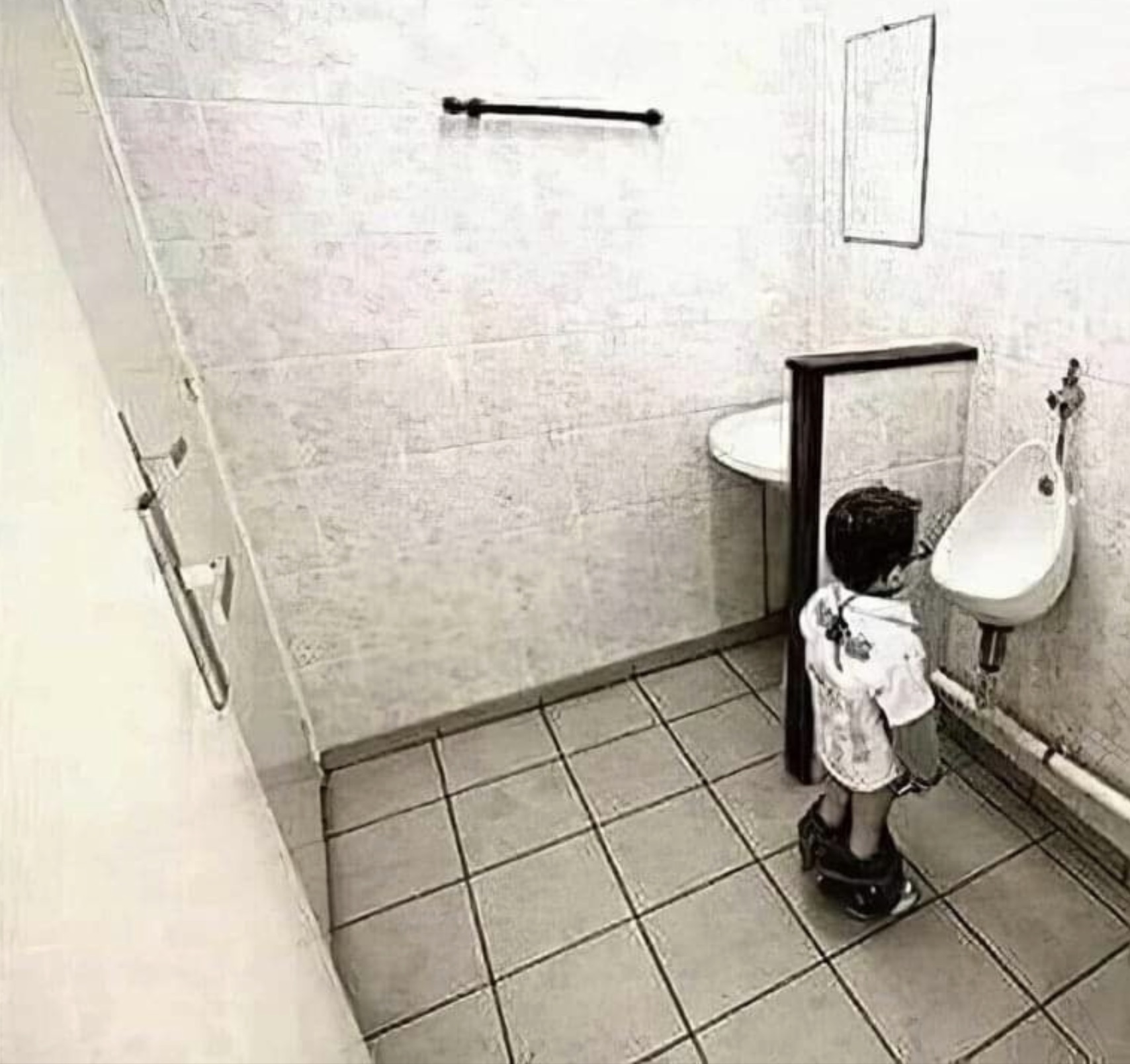 kid cant reach urinal