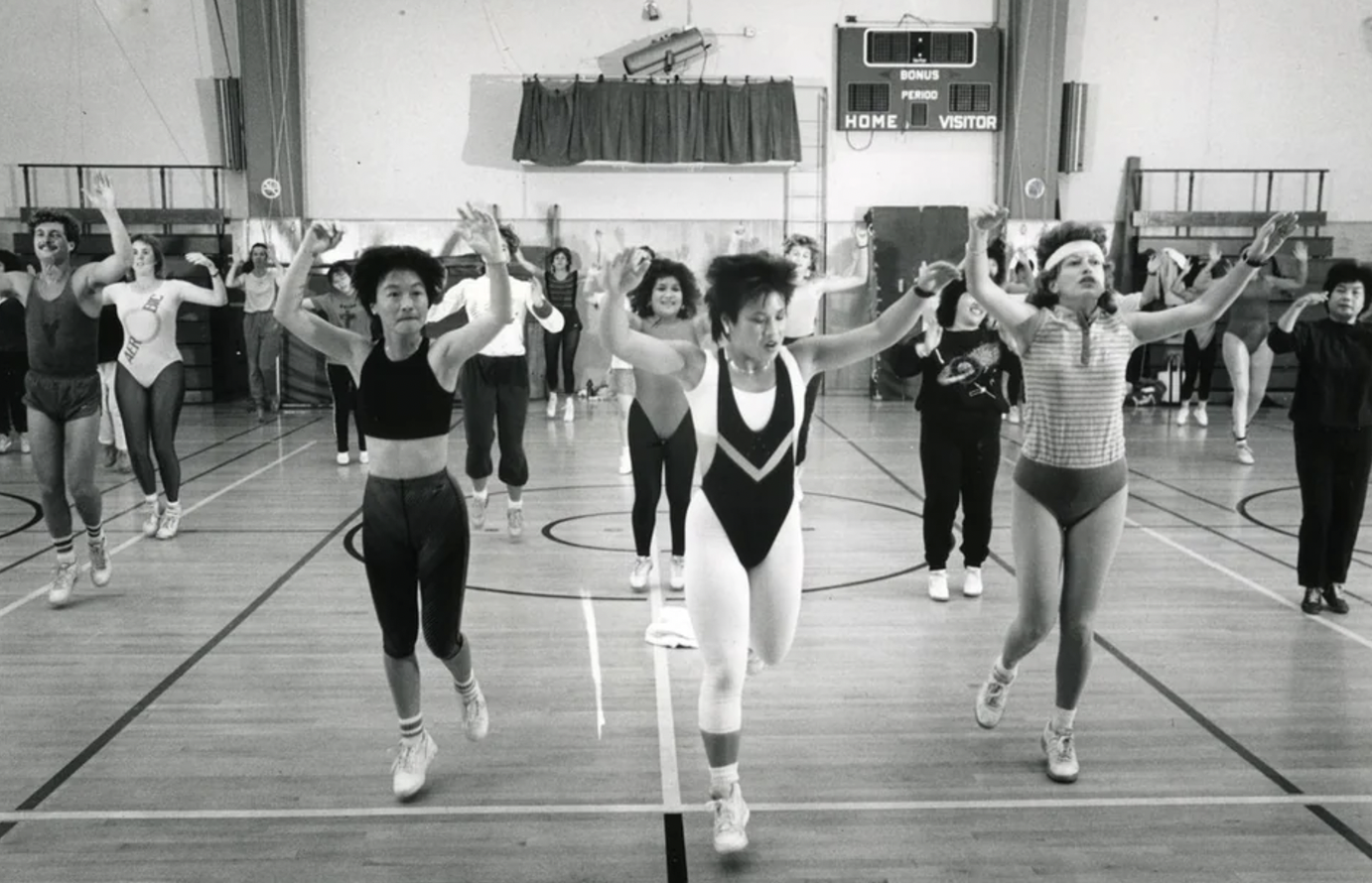 Men and women at aerobics class with live band at UC San Francisco Millberry Union, October 1987.