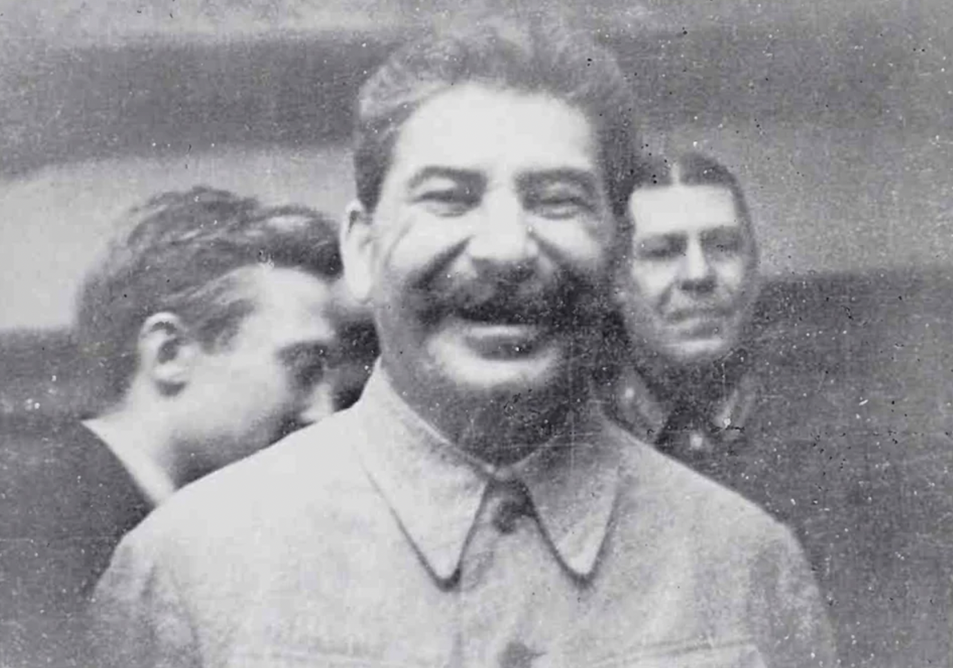 Stalin smiles after signing the German-Soviet Non-Aggression Pact, August 1939.