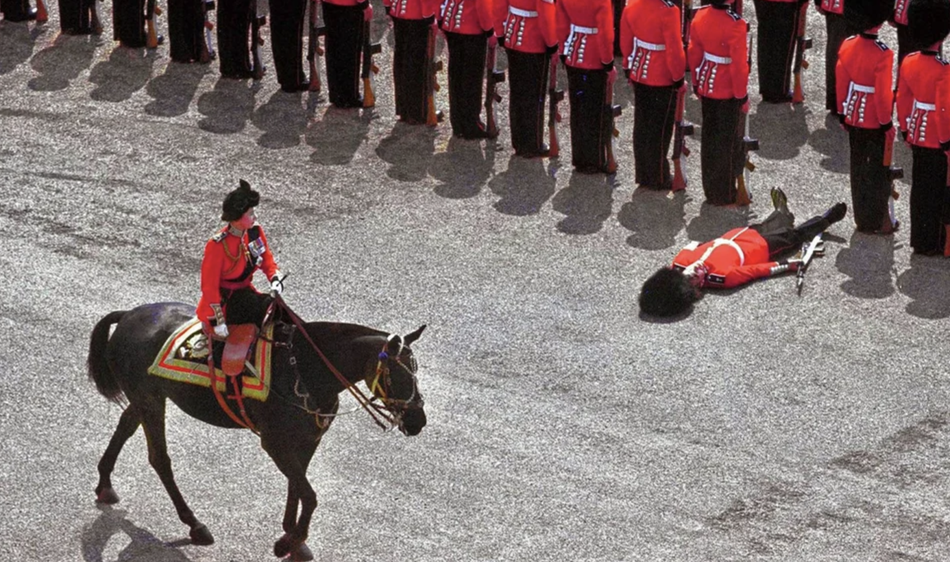 A guard of honor passes out as Queen Elizabeth II rides past during the color parade, 1970.