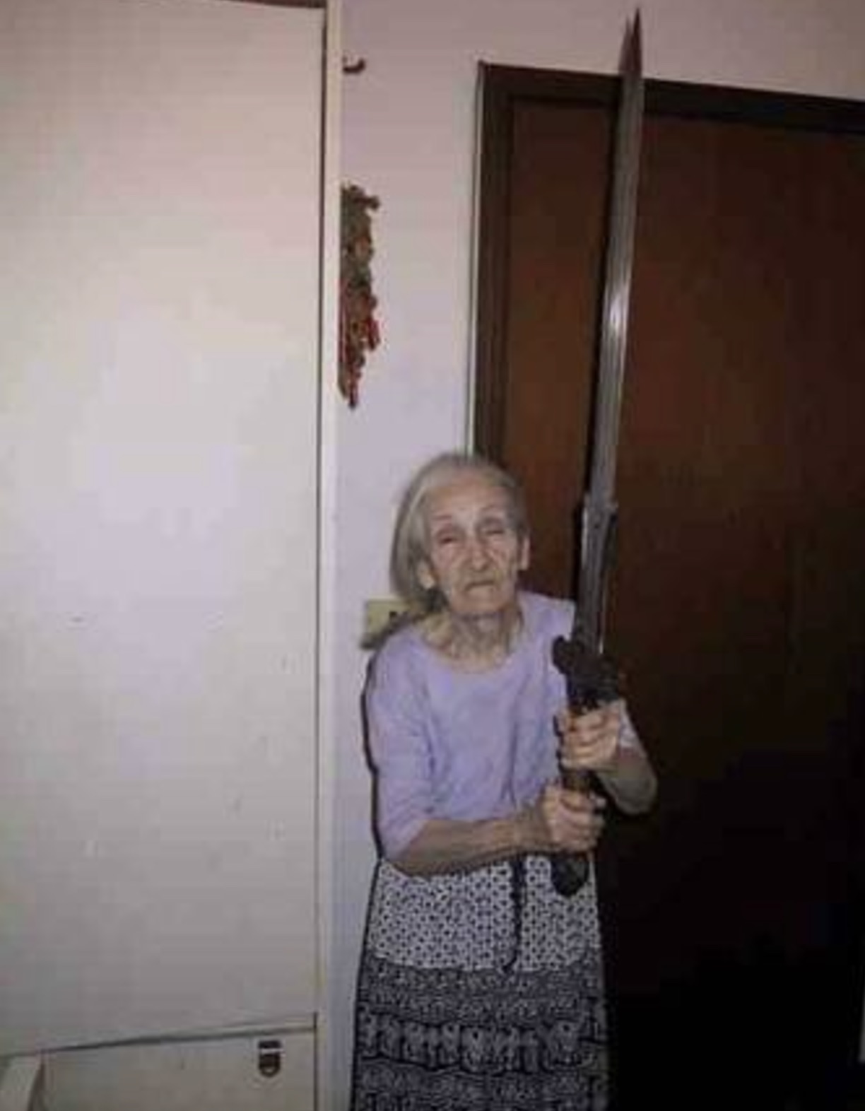 old woman with sword