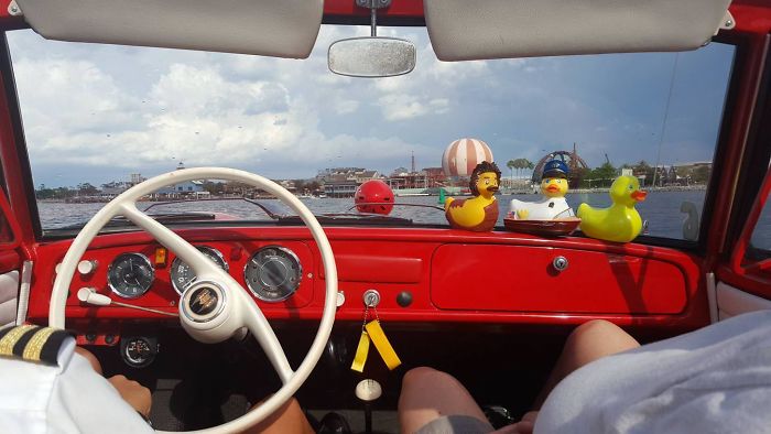 The view from inside of an Amphicar that drives both on the road and in the water.