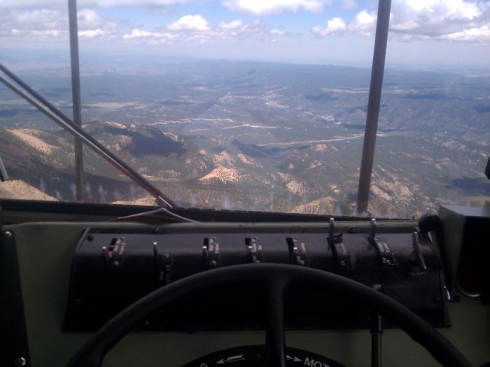 The breathtaking view from this engineer's chair of a Swiss Cog train that is 50 years old.