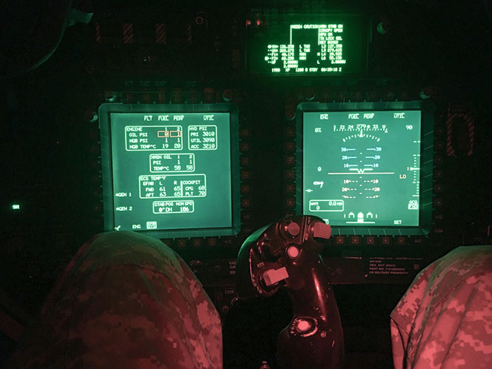 The controls / cockpit of an AH-64D Apache Edition helicopter.