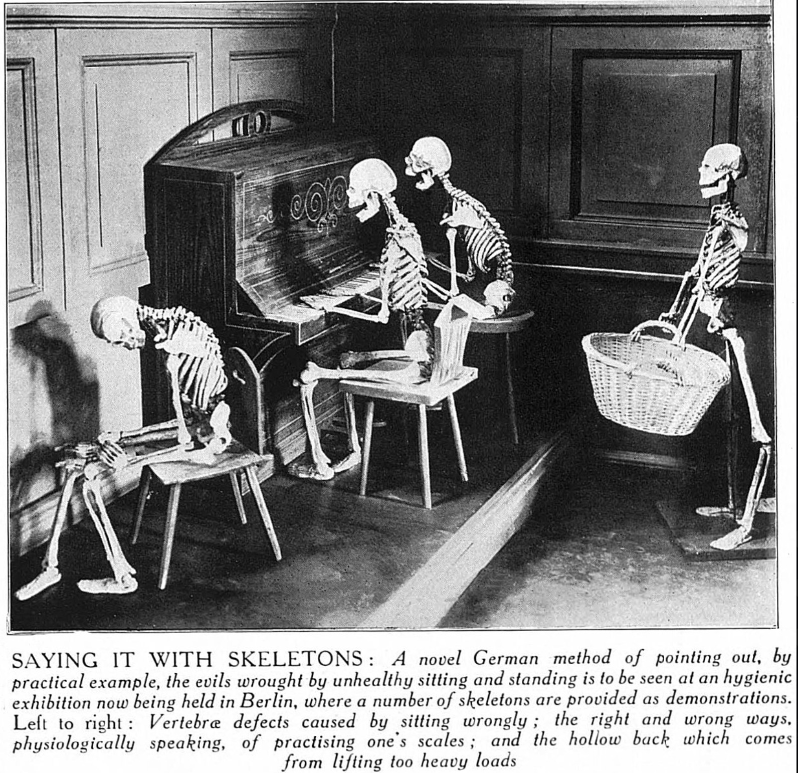 Skeleton - Saying It With Skeletons A novel German method of pointing out, by practical example, the evils wrought by unhealthy sitting and standing is to be seen at an hygienic exhibition now being held in Berlin, where a number of skeletons are provided