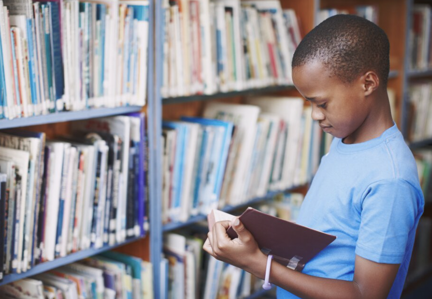 kid reading a book