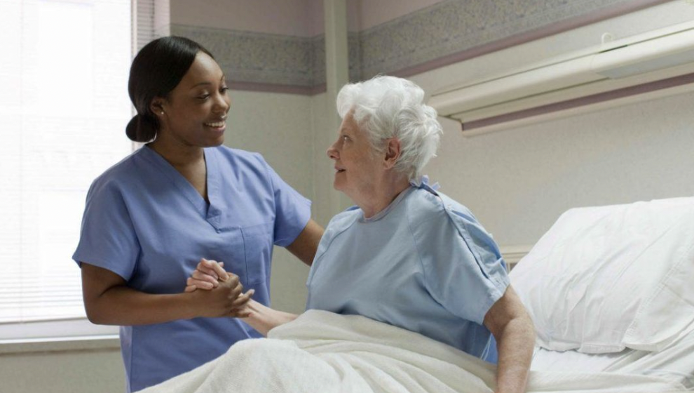 old woman in hospital bed