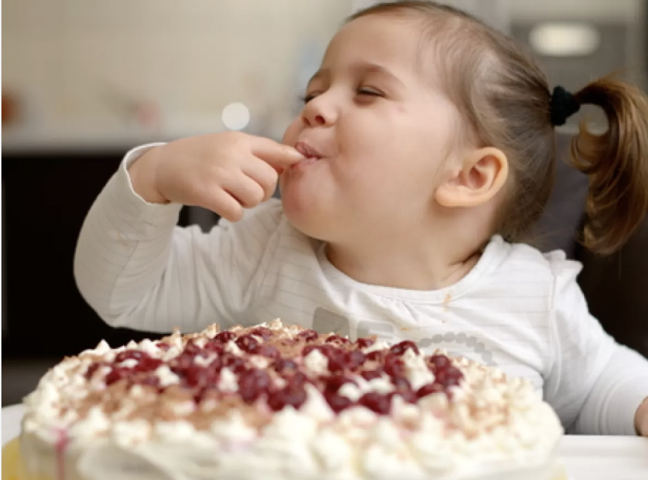 child eating sweets