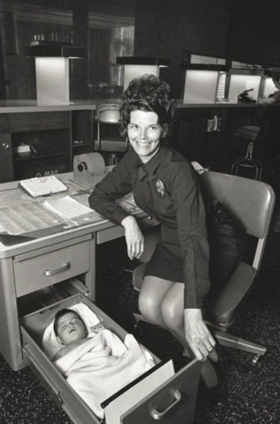 baby in desk drawer