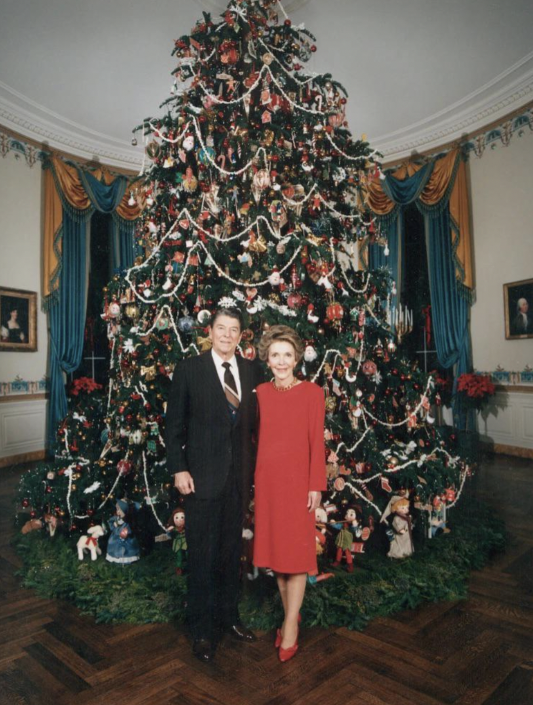 In front of the White House Christmas tree, 1980s.