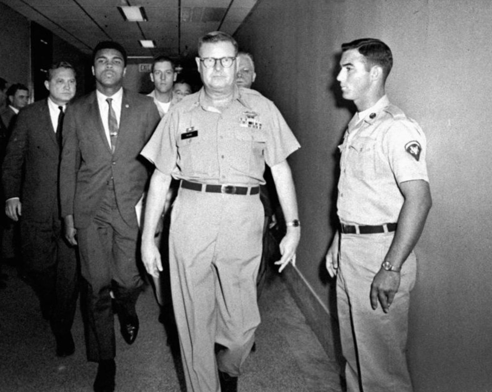 Walking from the courtroom after being sentenced to five years as a conscientious objector to the war in Vietnam. 1967.