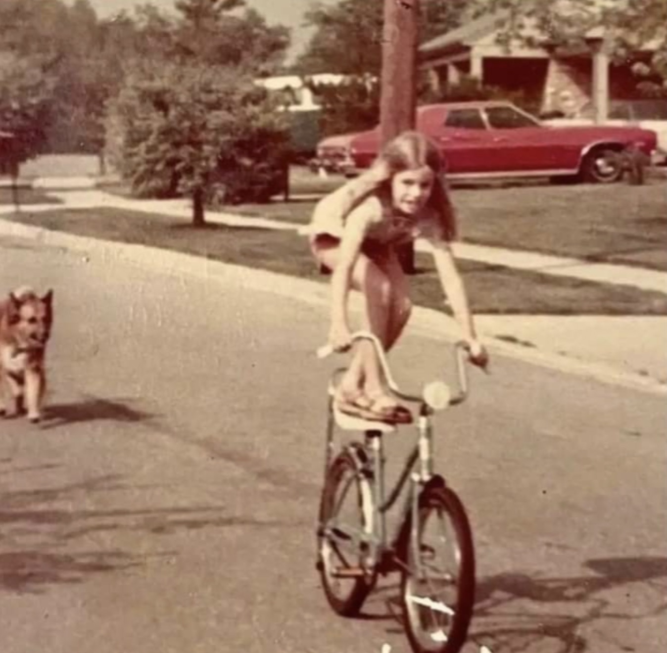 riding bike standing on seat