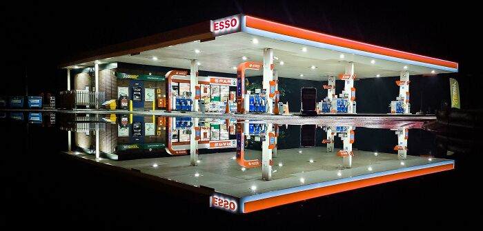 This gas station's picture perfect reflection after a heavy rain.