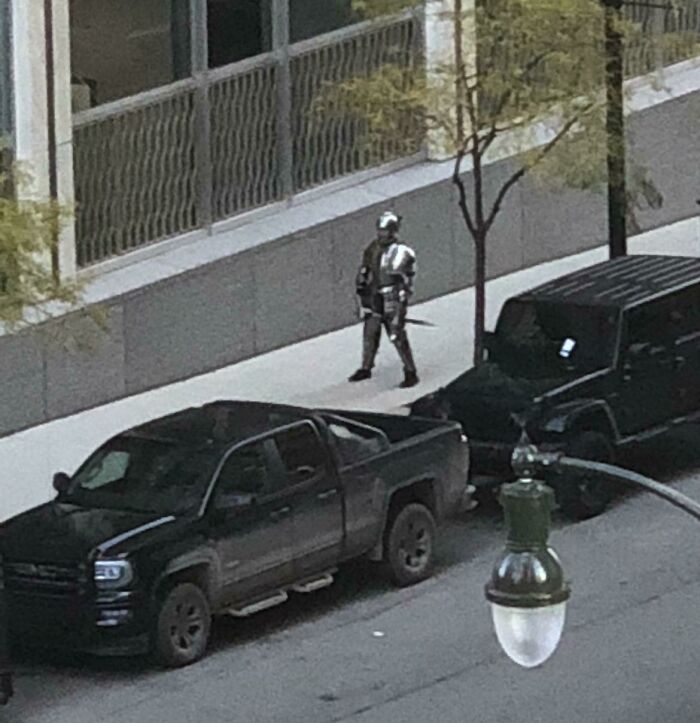 Just a man in Medieval armor chilling in Detroit.