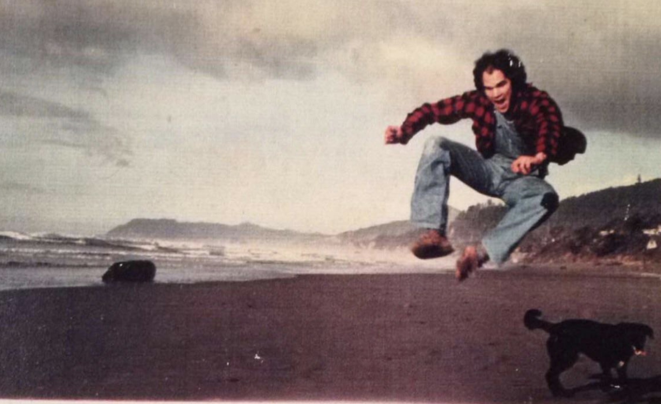 “Reaching the Pacific Coast in Oregon with his dog Charlie.” 1977.