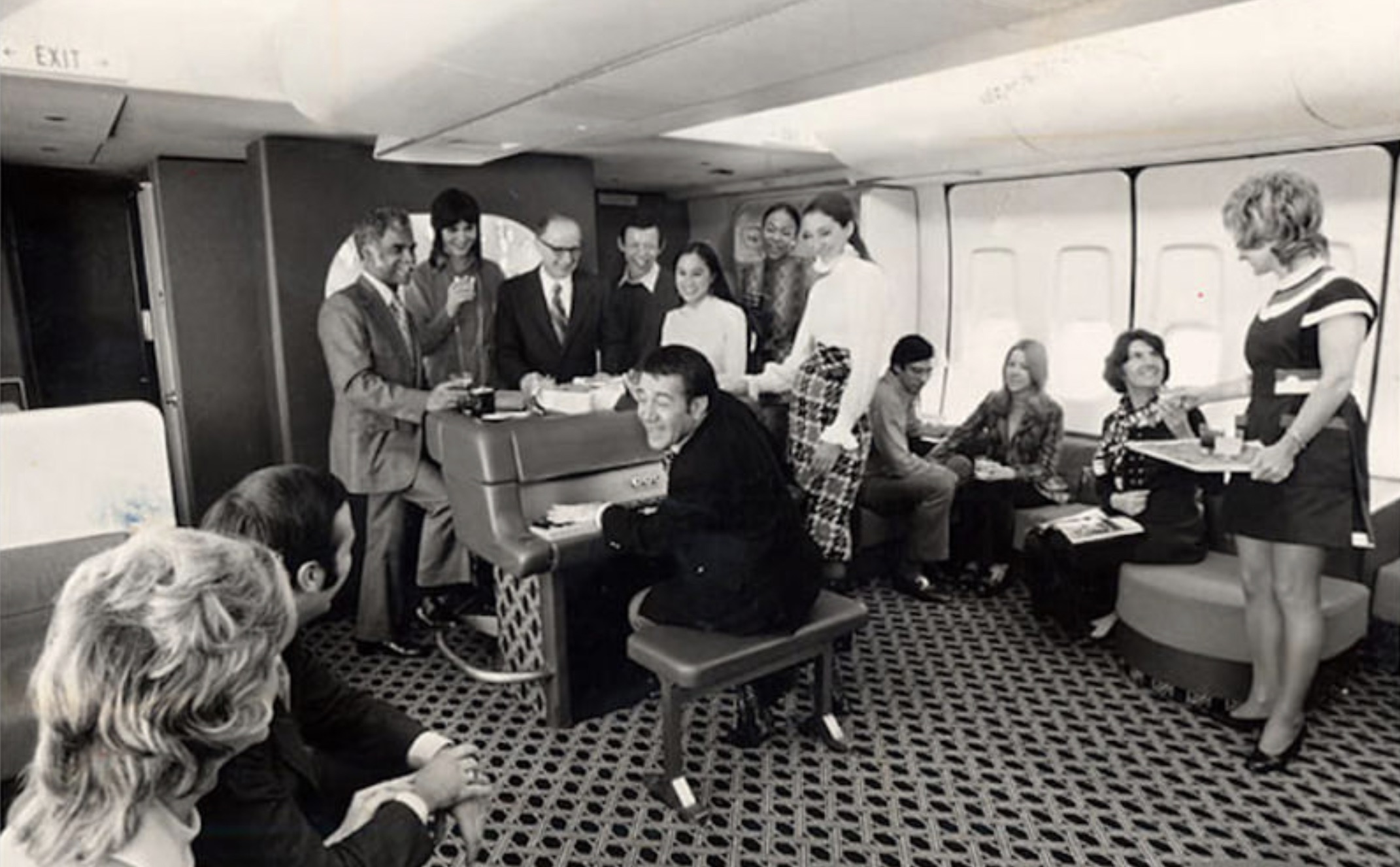 In the back of an American Airlines flight in the ‘70s.