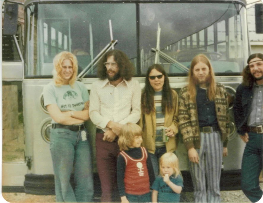 A Band and Their Tour Bus 