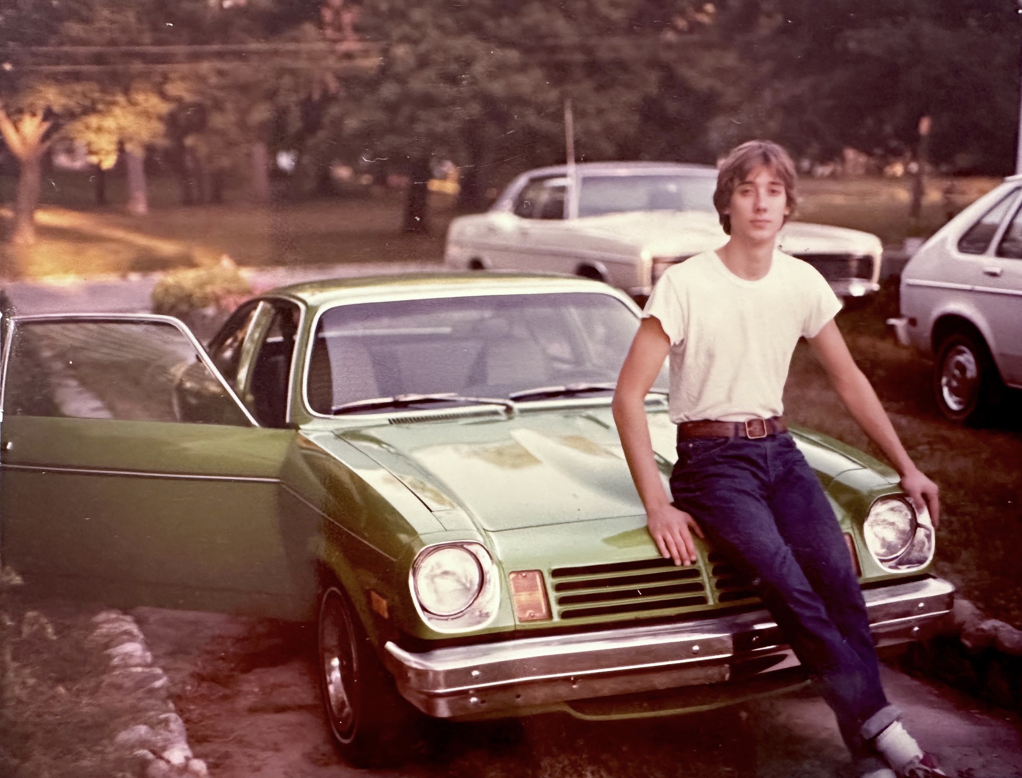 24 1970s Pics Of Chicks & Dudes On The Hoods Of Cars