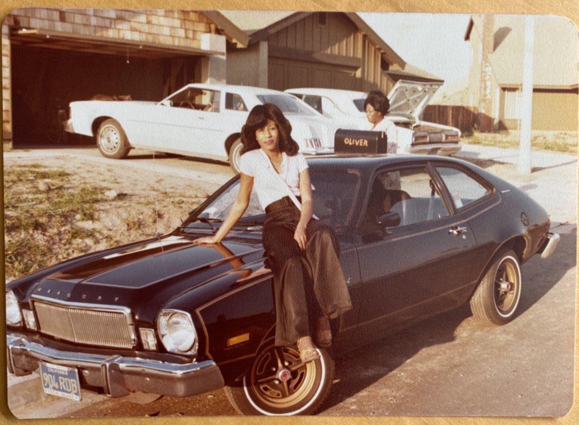 24 1970s Pics Of Chicks & Dudes On The Hoods Of Cars