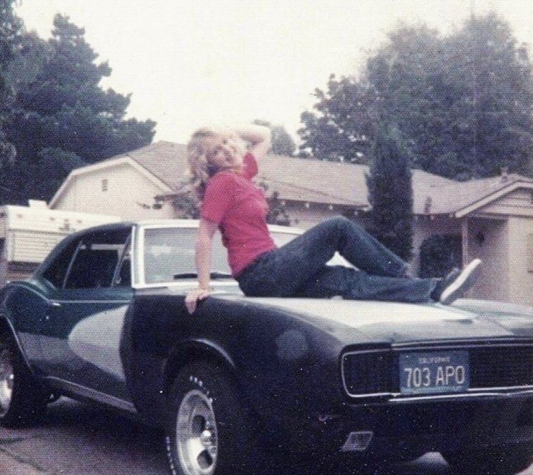 24 1970s Pics Of Chicks & Dudes On The Hoods Of Cars