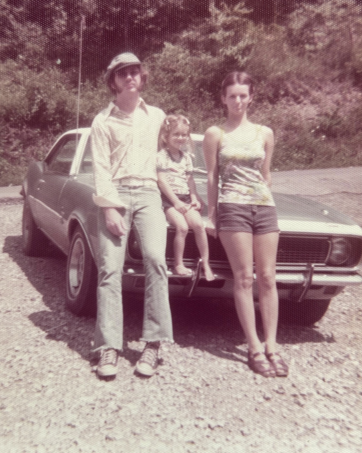 24 1970s Pics Of Chicks & Dudes On The Hoods Of Cars
