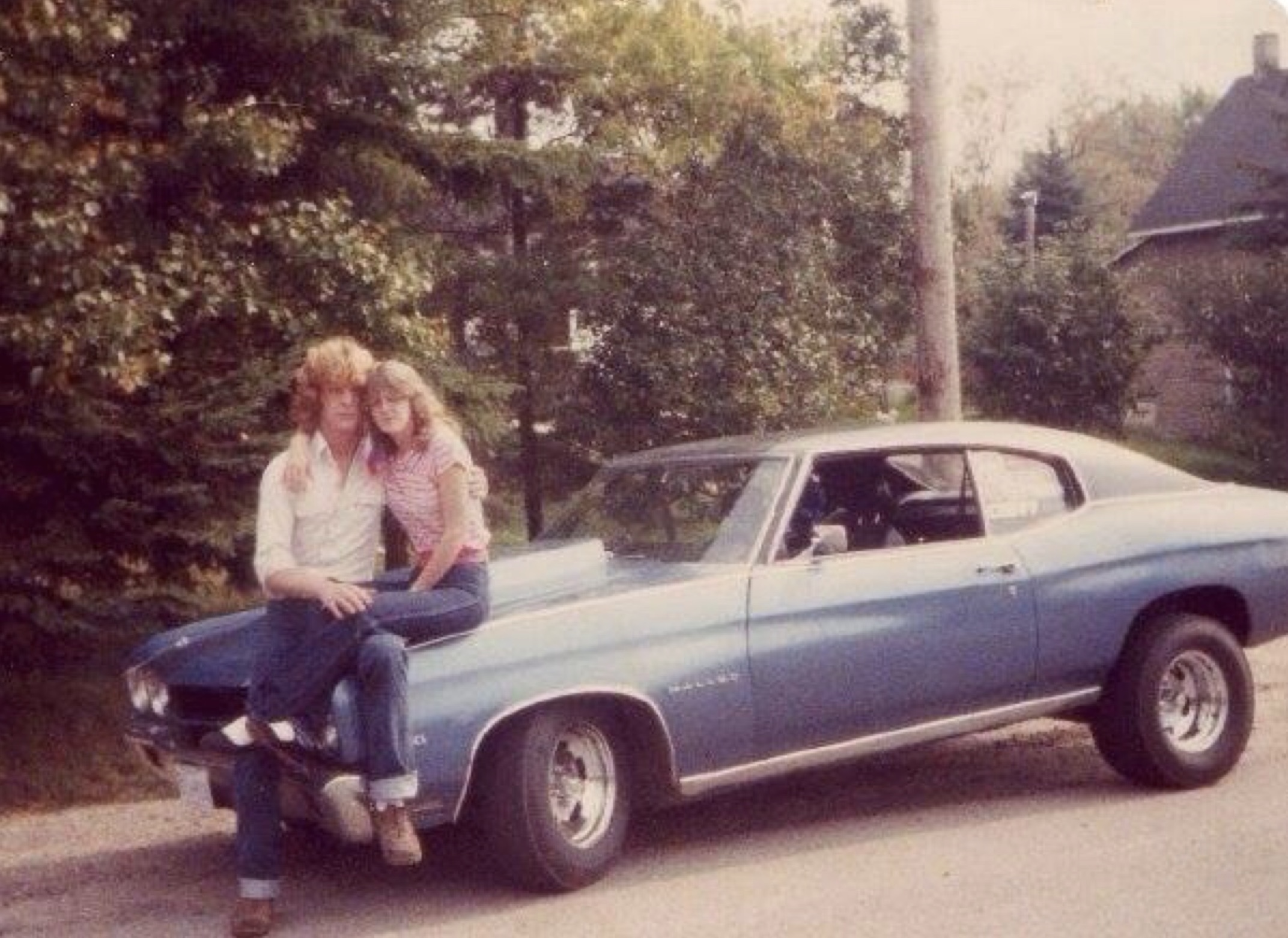 24 1970s Pics Of Chicks & Dudes On The Hoods Of Cars