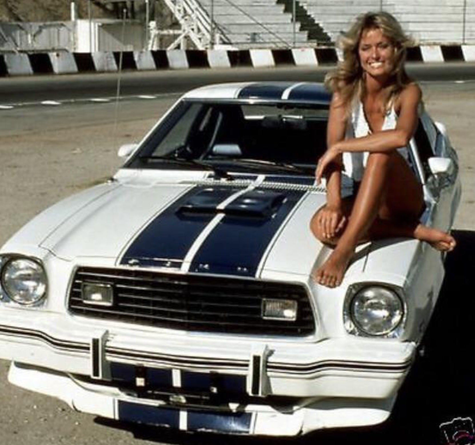 24 1970s Pics Of Chicks & Dudes On The Hoods Of Cars