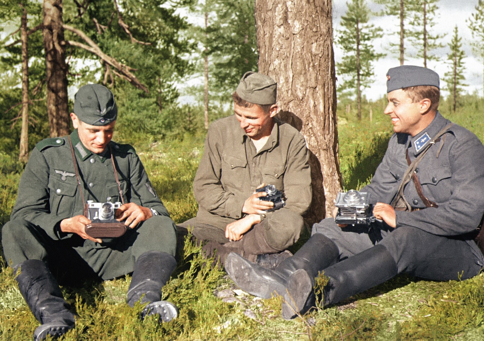A German soldier, a Soviet POW and a Finnish TK-Man 