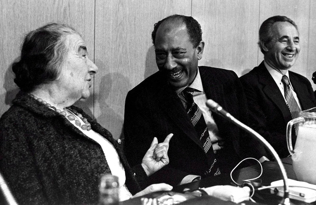 Sadat of Egypt and Golda Meir of Israel
