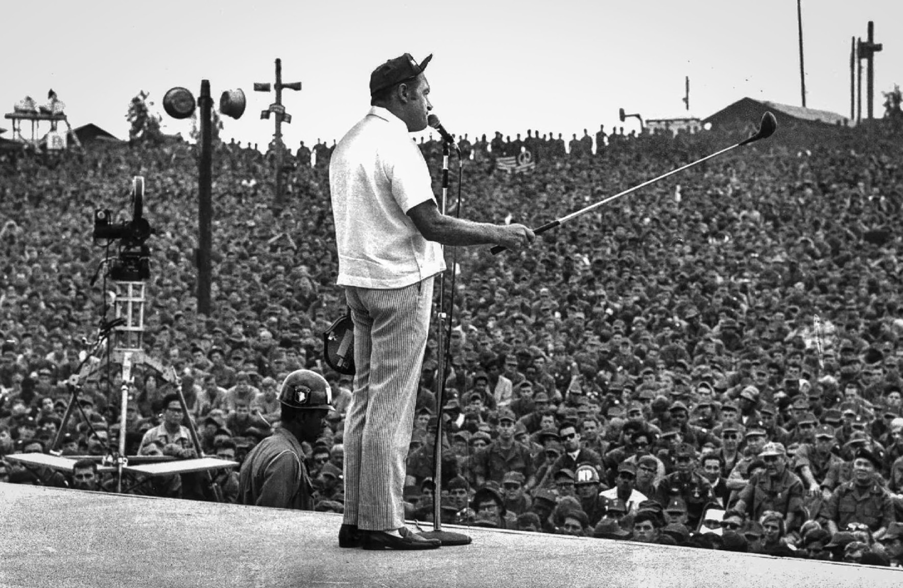 Bob Hope doing a set at a USO tour show in Vietnam.