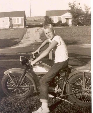 A young Gregg Allman on his motorcycle.