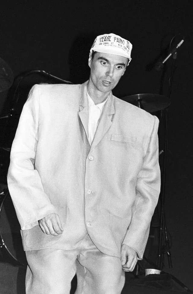 David Byrne of Talking Heads in NYC with his iconic big suit - 1983