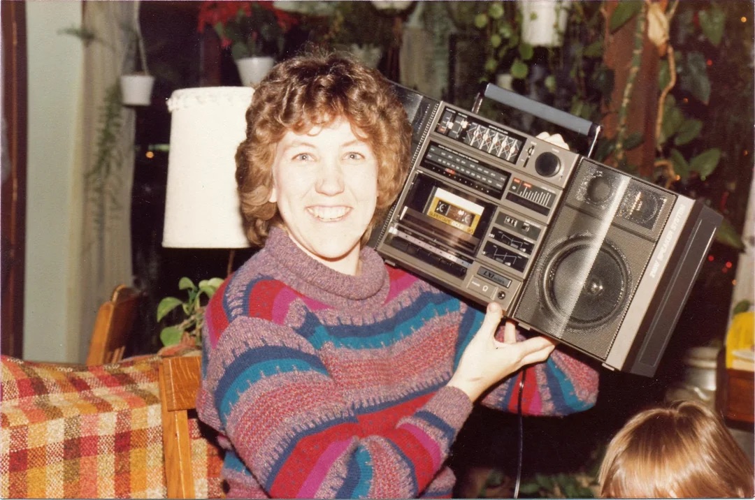 A Redditor's mom with her brand new boom box - 1988