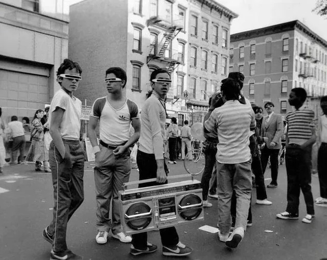 Space-aged youngsters with boomboxes.