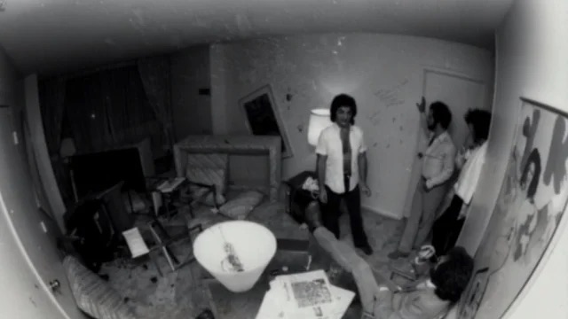 The Eagles in their trashed hotel room.
