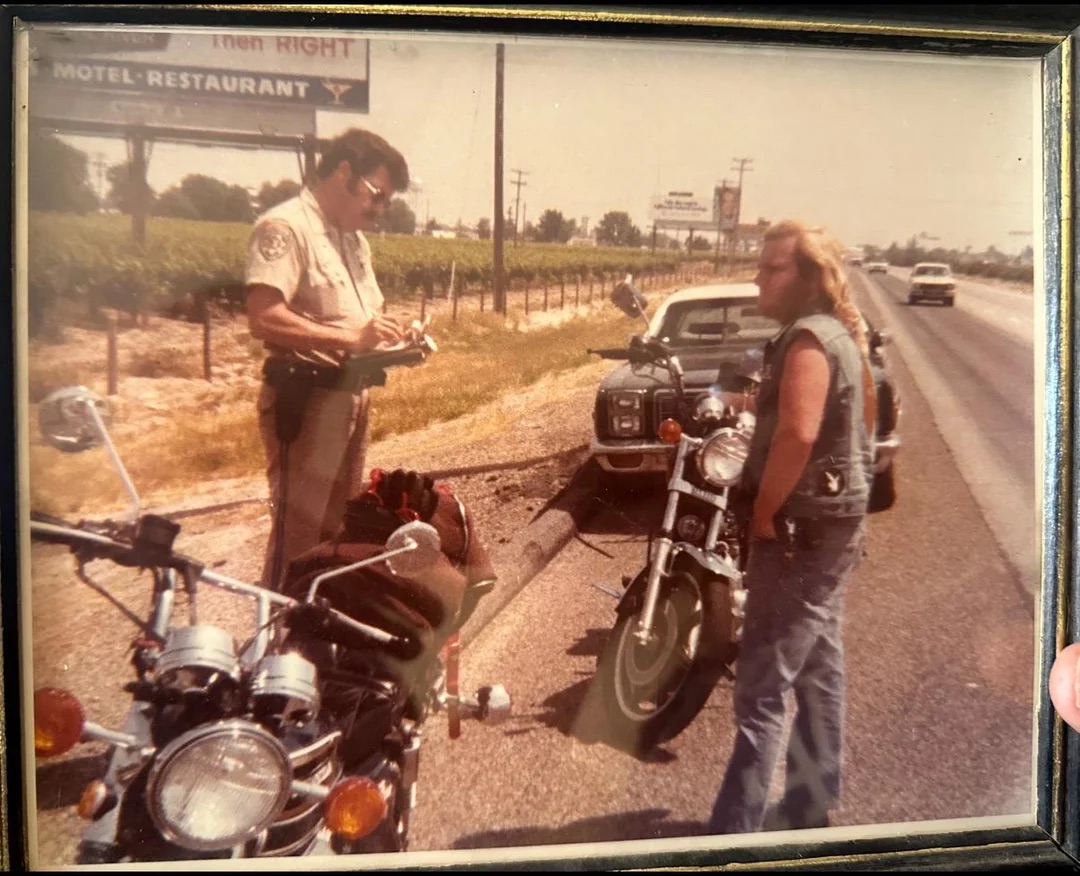 A biker getting pulled over in 1978.