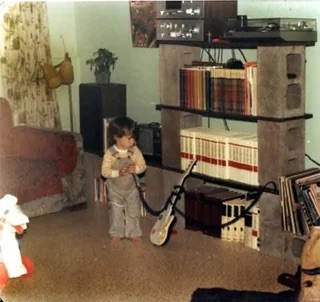 A toddler in his living room - 1978