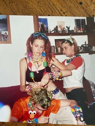 Teens getting ready for a rave.