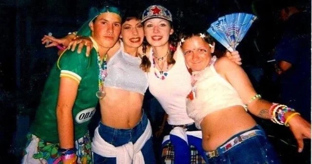 A group of ravers in the '90s.