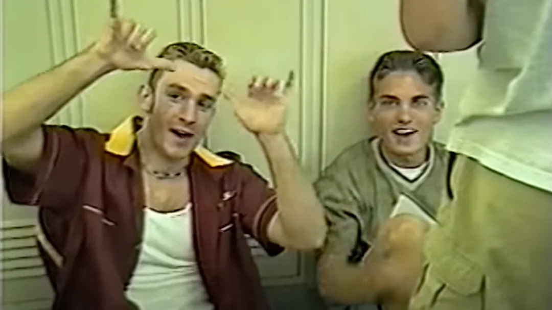 Chillin' with frosted tips in the high school hallway.